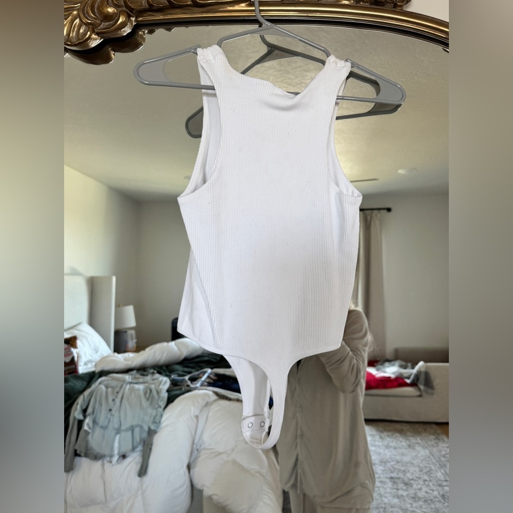 Vestique White Bodysuit with High Neckline